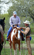 Buck giving help to Brenda Hughes