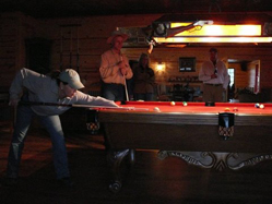 Brenda Hughes shooting pool with Buck